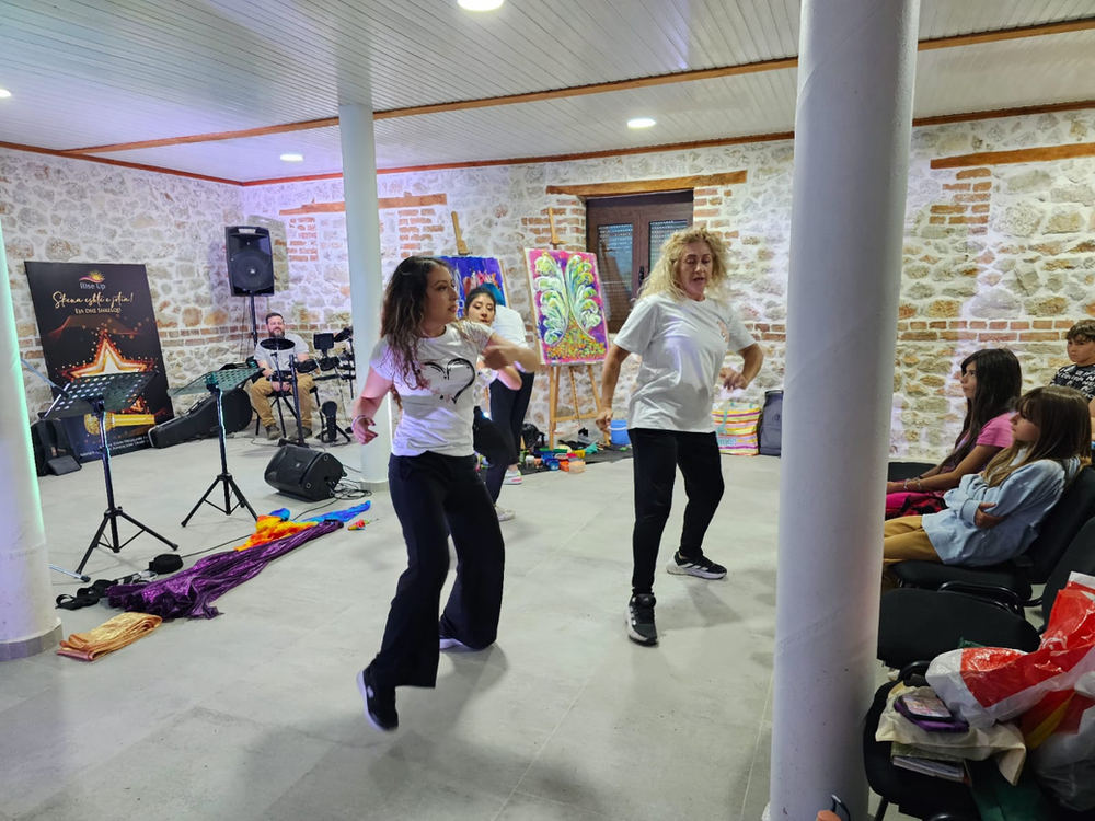 Young people performing during the Albania campaign